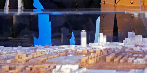 Krav på hälften trä i statens byggen